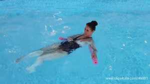 jess-black-puma-swimsuit-in-the-pool-and