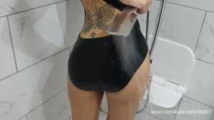 jess-black-puma-swimsuit-in-the-pool-and