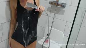 jess-black-puma-swimsuit-in-the-pool-and