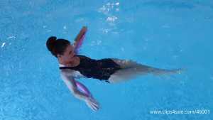 jess-black-puma-swimsuit-in-the-pool-and