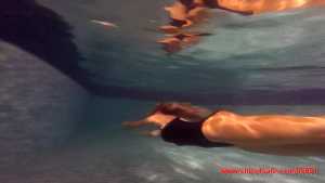 loren-in-her-wet-swimsuit-swimming-in-th