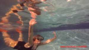 loren-in-her-wet-swimsuit-swimming-in-th