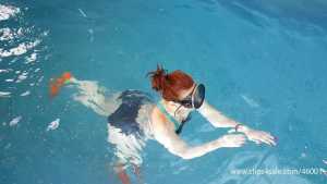 swimming-with-flippers-underwater-emeral