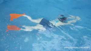 swimming-with-flippers-underwater-emeral