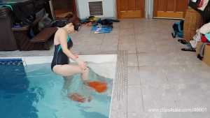 swimming-with-flippers-underwater-emeral